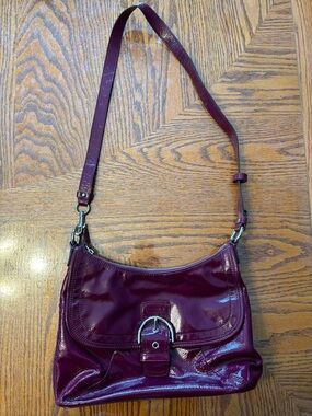 Coach Plum Patent Leather Crossbody Bag with Buckle Accent